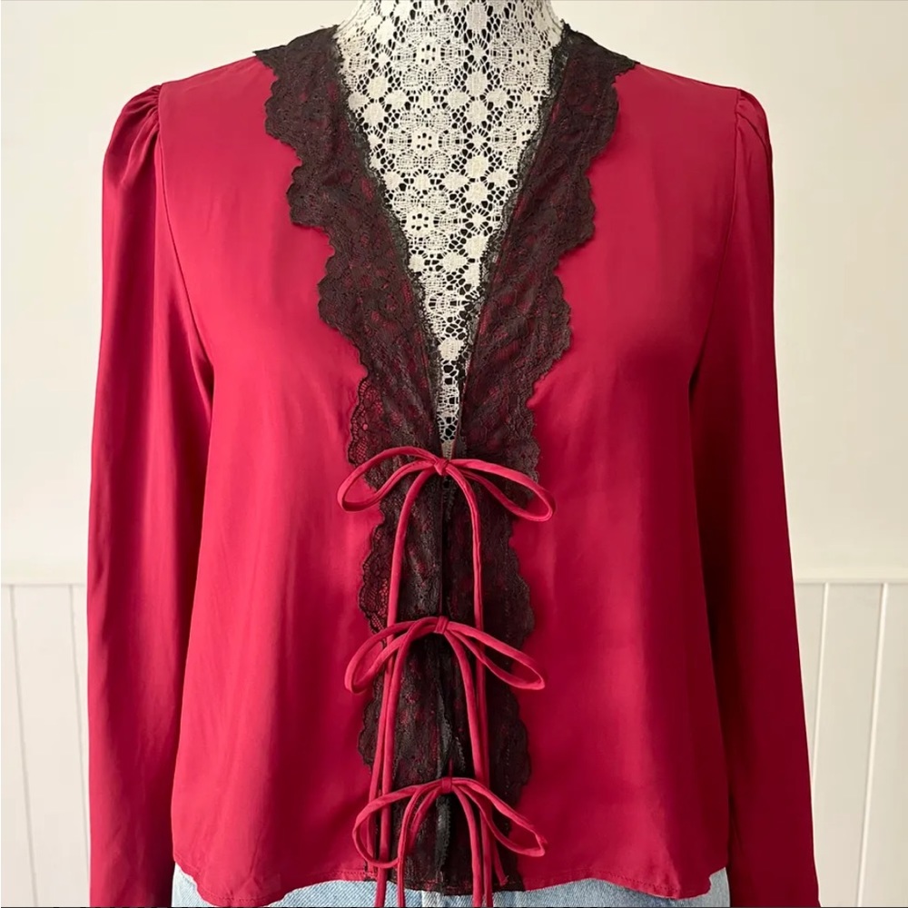 Red and black embroidered blouse